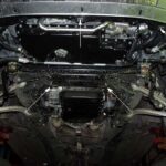 Audi A4 B5 underside before installation with mounting points marked