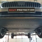 Front underside view of Audi A3 with installed steel underbody protection