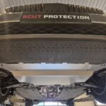 Front underside view of Audi A3 with installed aluminum underbody protection