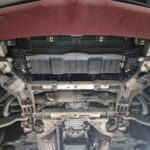 Alfa Romeo Stelvio underside before installation with front mounting brackets fitted