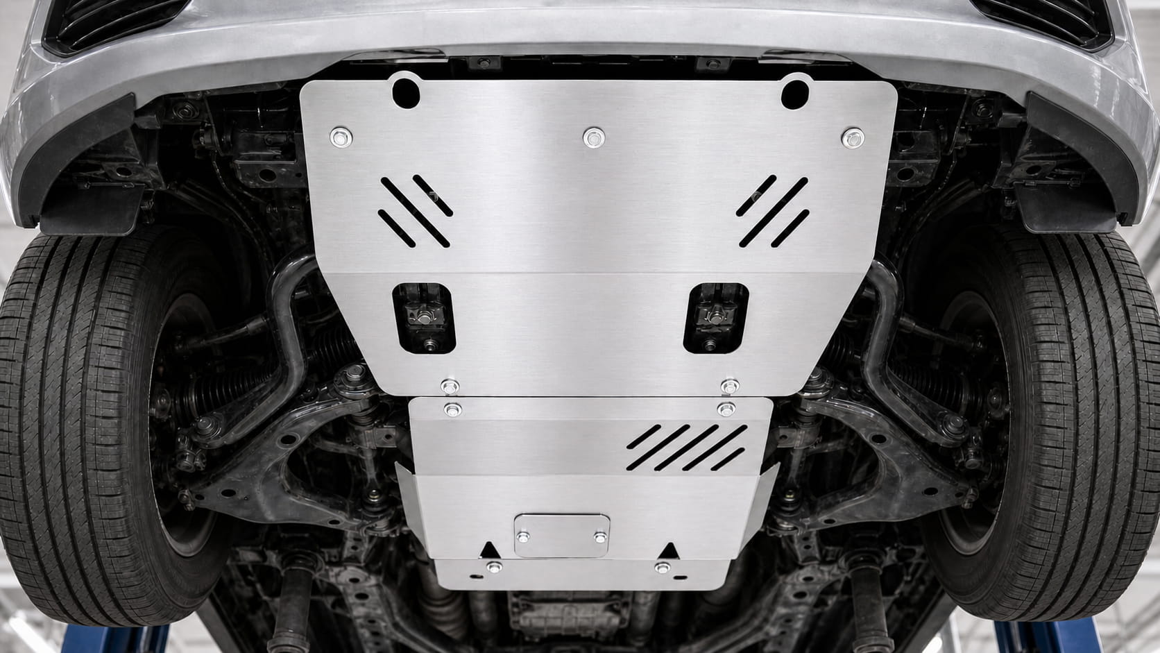 Aluminium underbody skid plate on a neutral background showing lightweight corrosion-resistant design