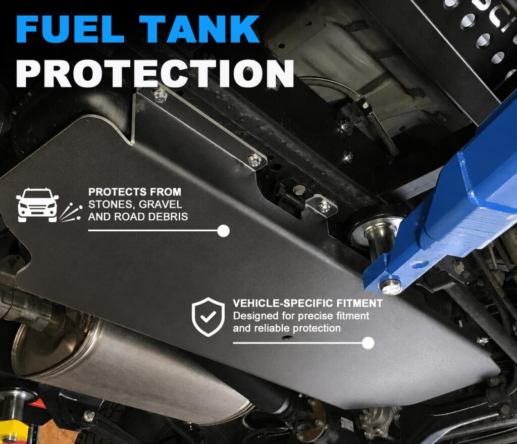 Rear fuel tank skid plate under an SUV protecting the tank area from rocks, gravel and winter road impacts