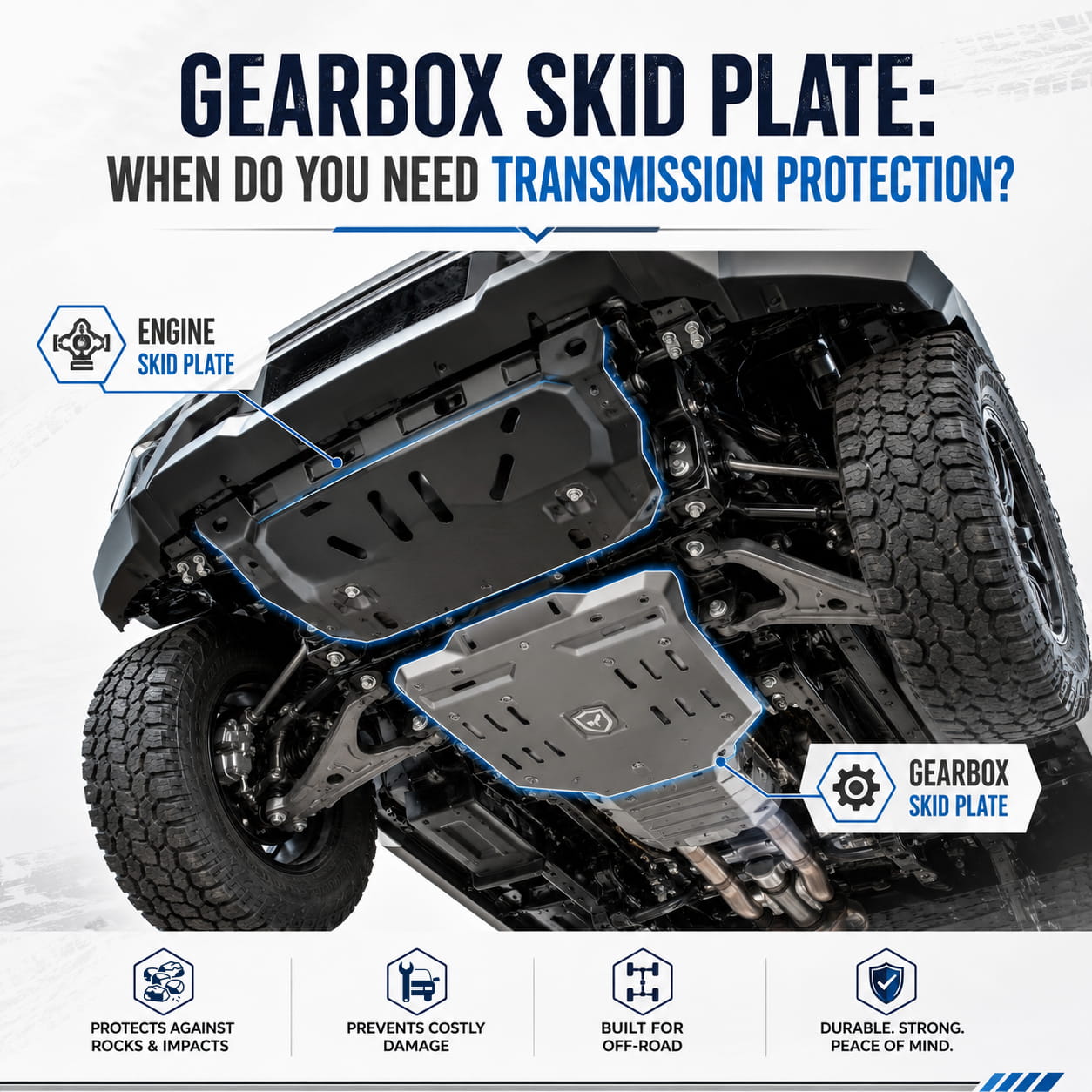Gearbox skid plate under vehicle showing highlighted transmission protection area and engine skid plate